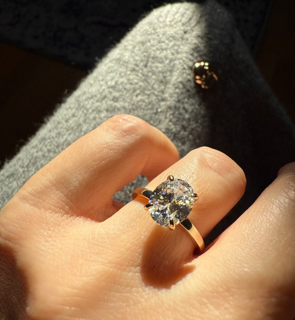 ANAÏS oval diamond engagement ring in 18k rose gold with hidden pavé halo