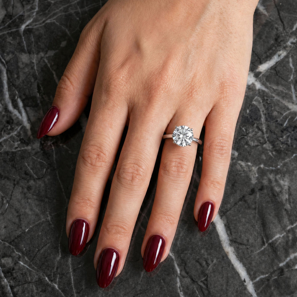 Front view of BERTA diamond ring with sapphire accent in white gold