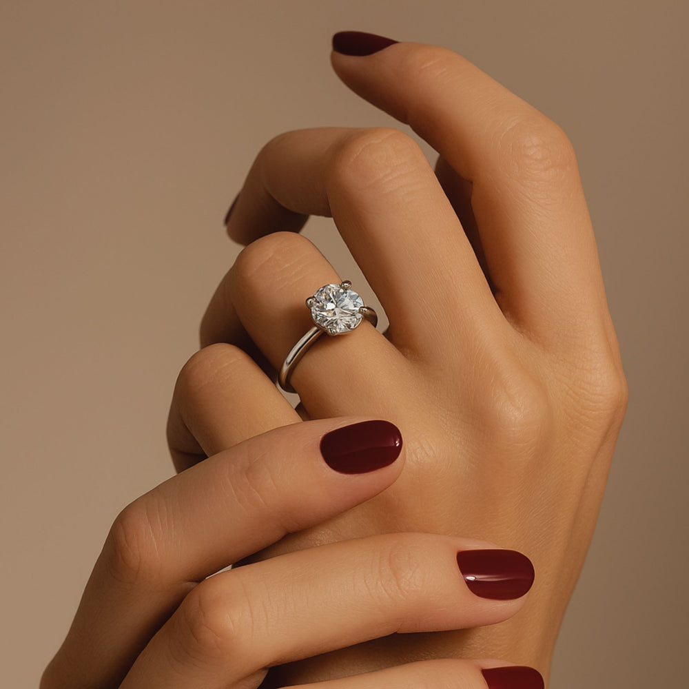 Solitaire diamond engagement ring in 18k rose gold 