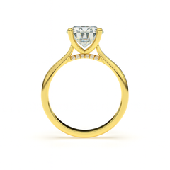 Side profile of ÉLODIE ring in yellow gold with hidden pavé diamonds