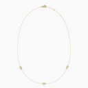 Delicate necklace in yellow gold featuring three evil eye–shaped diamond elements spaced along a fine chain, with an adjustable clasp.