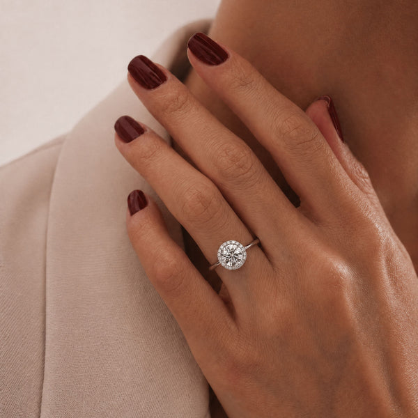 Halo Ring natural traceable diamond on models hand 