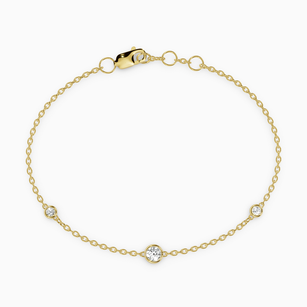 PURE diamond bracelet in yellow gold with bezel-set natural diamonds, fine chain design for everyday wear