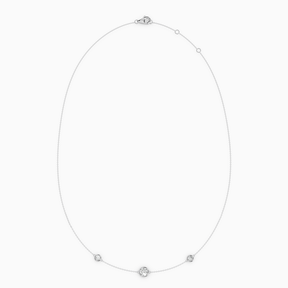 PURE diamond necklace in white gold with bezel-set natural diamonds, delicate fine chain with slightly larger center stone