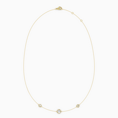 PURE diamond necklace in yellow gold with bezel-set natural diamonds, delicate fine chain with a slightly larger center stone