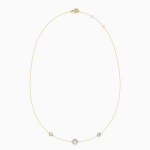 PURE diamond necklace in yellow gold with bezel-set natural diamonds, delicate fine chain with a slightly larger center stone