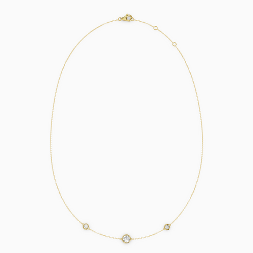 PURE diamond necklace in yellow gold with bezel-set natural diamonds, delicate fine chain with a slightly larger center stone