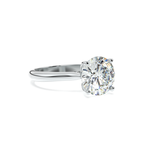 Angled shot of diamond engagement ring in 18k white gold