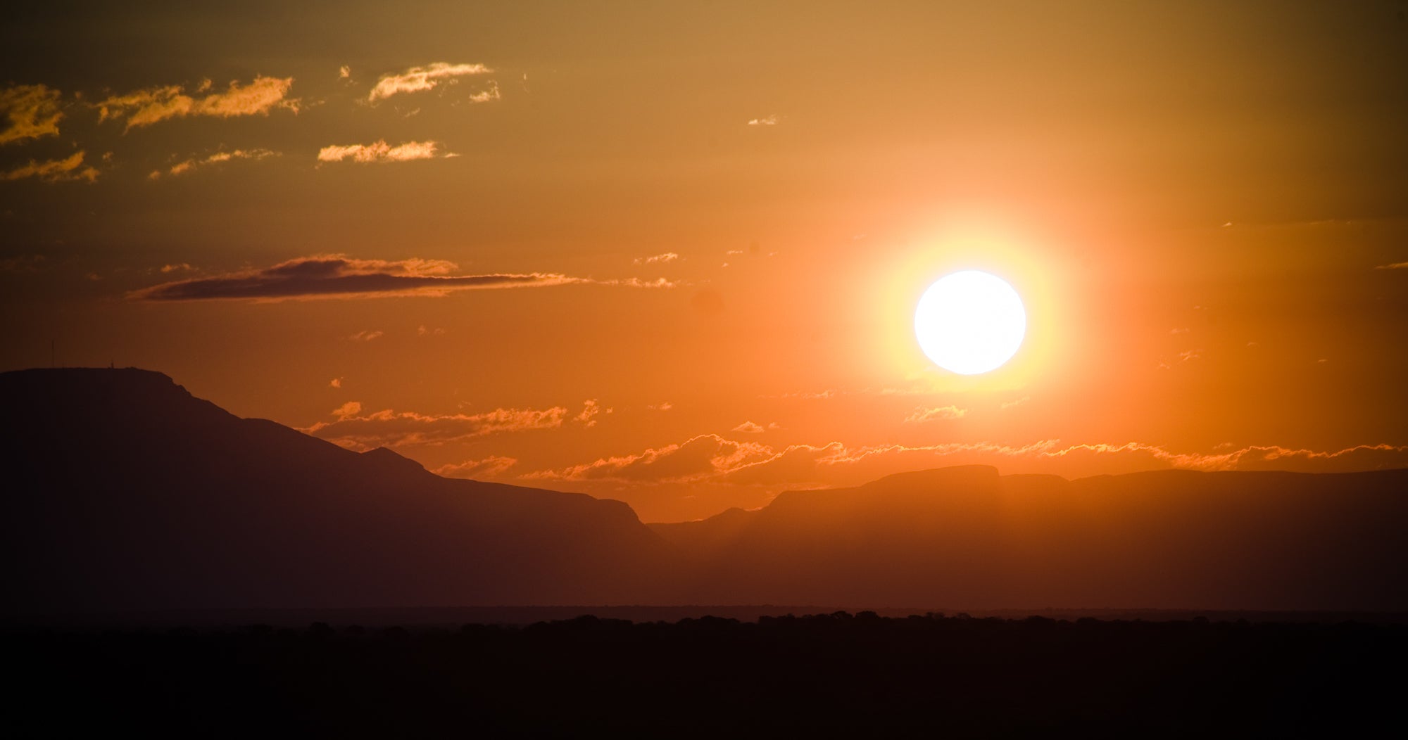 Sunset over African landscape – origin of traceable natural diamonds